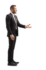 Man in formal clothes gesturing with hand