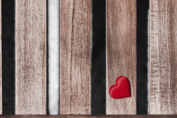 Valentine's day background with red hearts on wooden background. copy space. love concept.