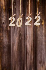New year calendar 2022 concept on old brown wood