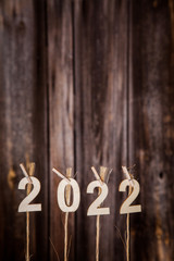 New year calendar 2022 concept on old brown wood