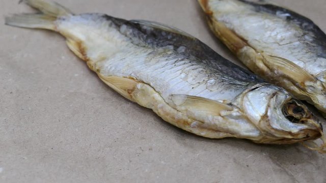 Dried Salt Fish Kraft Paper Background Panning Slider Shot.