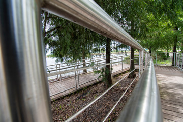 Close up of a rail in a beautiful park.