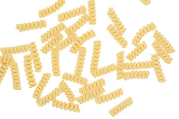 Lot of whole fresh raw pasta fusilli bucati flatlay isolated on white background