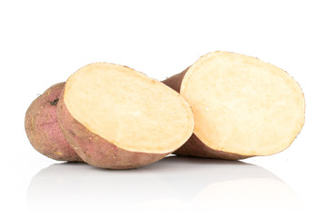 Group of two halves of fresh brown sweet potato isolated on white background