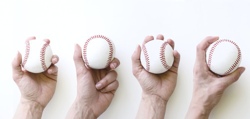 Baseball balls in hand on white background, pitching concept.