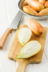 The golden shallot onion. Fresh bulbs.