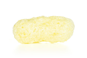 One whole salted yellow corn puff isolated on white background