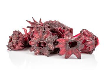 Lot of whole sweet red candied hibiscus in one group isolated on white background