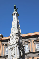 Fototapeta na wymiar Obelisk with satue of Saint Dominic in Naples