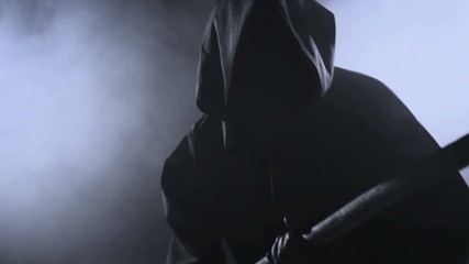 Horrible Dark Figure In A Hoodie With A Scythe
