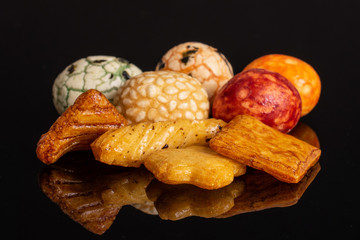 Lot of whole rice japan assortment isolated on black glass