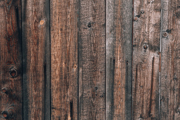 Dark wooden background. Darkened wood. Beautiful wooden background with dark wood and texture.