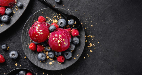 Berry refreshing ice cream scoops on plate - obrazy, fototapety, plakaty