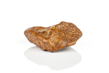 One whole brown sweet chocolate stone isolated on white background