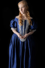 renaissance woman in a blue silk dress