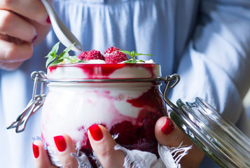 Delicious breakfast in woman hands, close up. Healthy eating concept.