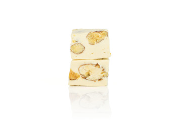 Group of two whole sweet white nougat isolated on white background