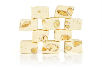 Lot of whole sweet white nougat isolated on white background