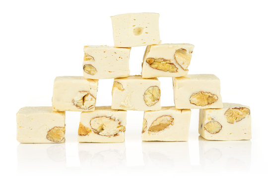Group of ten whole sweet white nougat isolated on white background