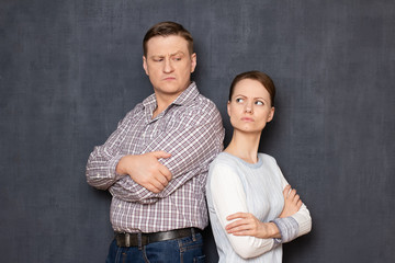 Portrait of disgruntled man and woman after quarrel