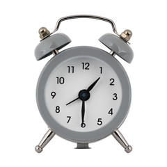 A gray clock with an alarm clock on a white background with arrows showing the time one hour thirty minutes or thirteen hours thirty minutes