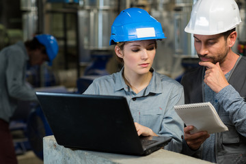 female enginer working with laptop