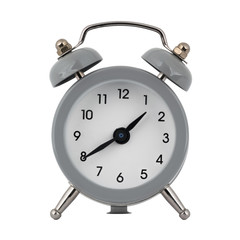 A gray clock with an alarm clock on a white background with arrows showing the time one hour forty minutes or thirteen hours forty minutes