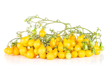 Lot of whole fresh yellow pear tomato in cluster isolated on white background