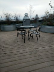 table and chairs on a roof