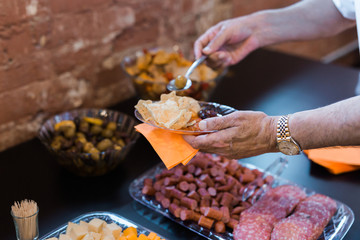 Man Going Through Buffet Line