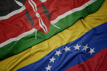 waving colorful flag of venezuela and national flag of kenya.