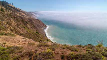 Fototapeta na wymiar Pacific Coast above the Clouds