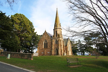 Fototapeta na wymiar An imposing old Church overlooking Ross. Australia.