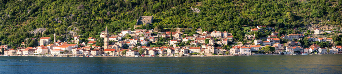 Fototapeta na wymiar Scenic panorama view of the historic town of Perast located at world-famous Bay of Kotor on a beautiful sunny day in summer, Montenegro