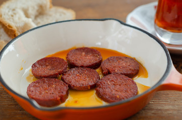 Fried turkish sucuk and tea