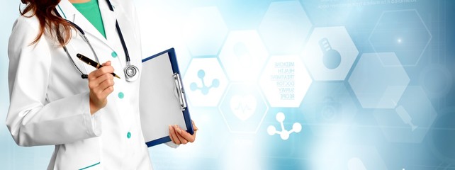 Portrait of doctor with stethoscope on blurred background