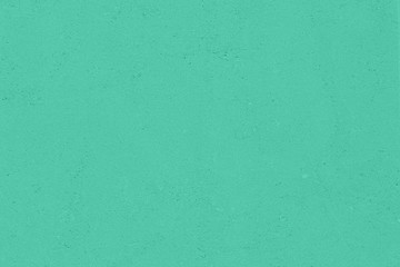 Trendy mint colored low contrast Concrete textured background with roughness and irregularities to your design or product. Color trend concept.