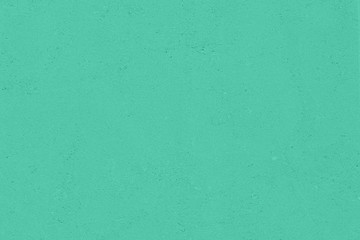 Trendy mint colored low contrast Concrete textured background with roughness and irregularities to your design or product. Color trend concept.