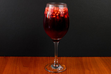 Strawberry wine glass with chopped mango