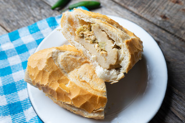 Mexican green tamal sandwich also called 