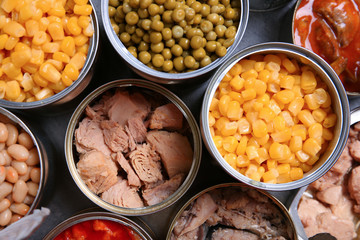 Open tin cans of conserved products, top view