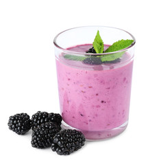 Delicious blackberry smoothie in glass on white background
