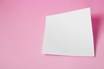Fototapeta na wymiar Empty sheet on pink background. Mockup for design