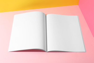 Empty book pages on color background. Mockup for design
