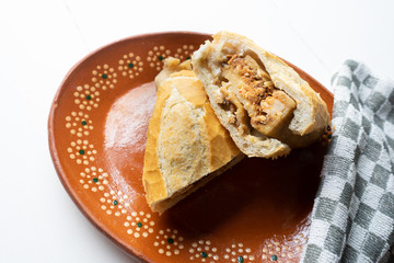 Mexican mole tamal sandwich also called 