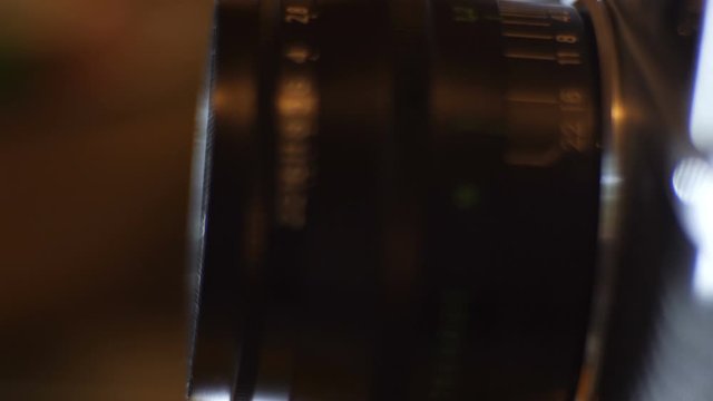 Close up of lens on vintage film camera