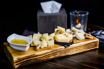 cheese board served with honey