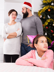 Parents lecturing daughter at Christmas
