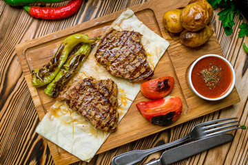 grilled steak on Turkish on wooden table