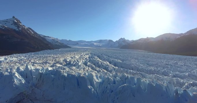 Amazing Aerial Flight above the Perito Moreno Glacier on a sunny day in Patagonia, Santa Cruz, Argentina.